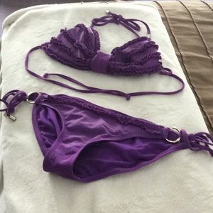 purple bikini. Top is small. Bottom is medium